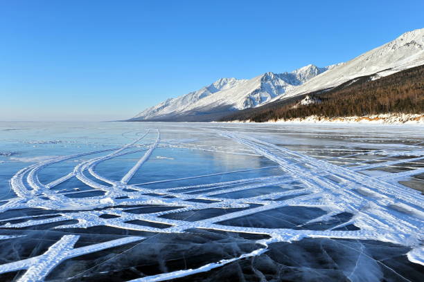 rocky cliff on lake baikal in winter. - lake baikal lake landscape winter imagens e fotografias de stock