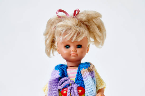 istock Vintage puppet, blond curly hair, on white background 1142008002