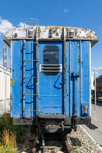 istock Old rusty railway wagon with an open door. 1142009526