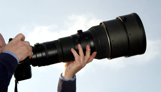 istock Far away photo. Big lens for professionals 1142012154