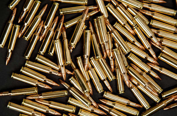 istock Rifle cartridges on a black background 1142012283