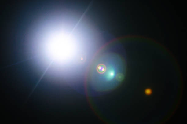 istock Abstract Natural Sun flare or Far star on the black background 1142012987
