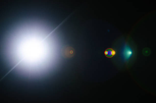 istock Abstract Natural Sun flare or Far star on the black background 1142014436