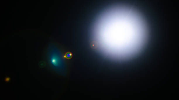 istock Abstract Natural Sun flare or Far star on the black background 1142014450