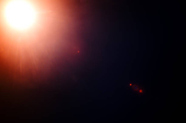 istock Abstract Natural Sun flare or Far star on the black background 1142014483