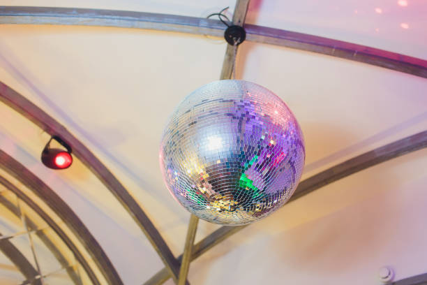 istock Disco ball with fireworks, night party background photo. 1142016580