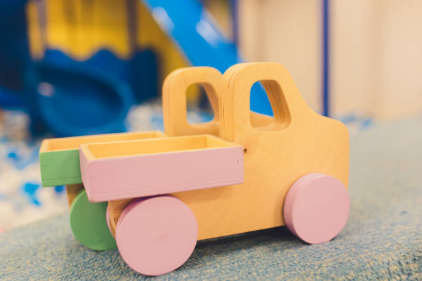 istock Children's toy. Model of an old lorry from a tree. 1142016646