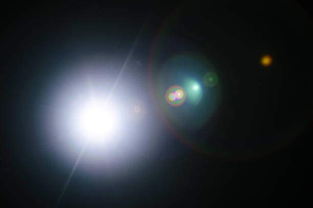 istock Abstract Natural Sun flare or Far star on the black background 1142017641