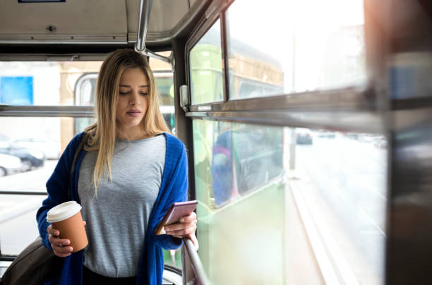 istock Young woman in public transportation 1142025201