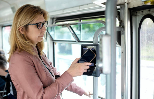 istock Mature woman in public transportation 1142025485