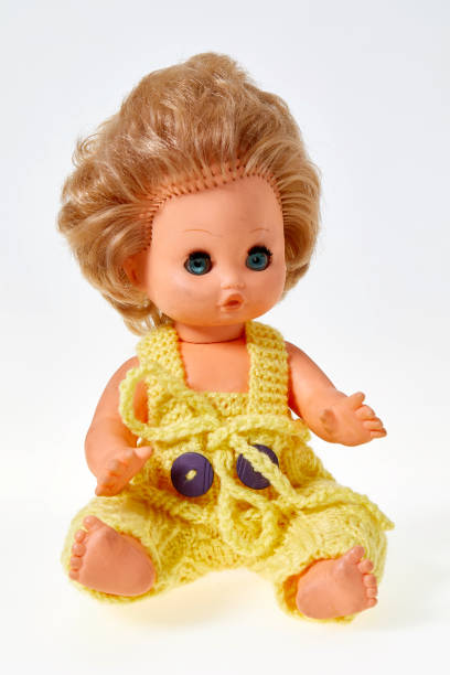 istock Vintage puppet,  blond curly hair, on white background 1142030881