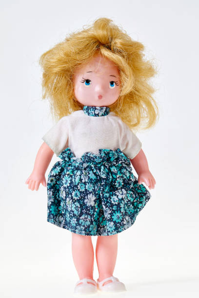 istock Vintage puppet,  blond curly hair, on white background 1142031068