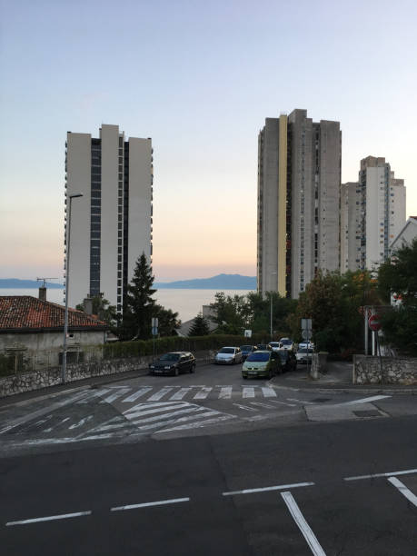 istock Sunset street city view 1142032176