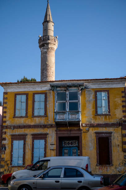 Basmane District, Izmir, Turkey Izmir, Turkey - April, 2019: Old, Greek house and a mosq in the old streets of Basmane district. Basmane is One of Izmir’s oldest quarters. Izmir stock pictures, royalty-free photos & images