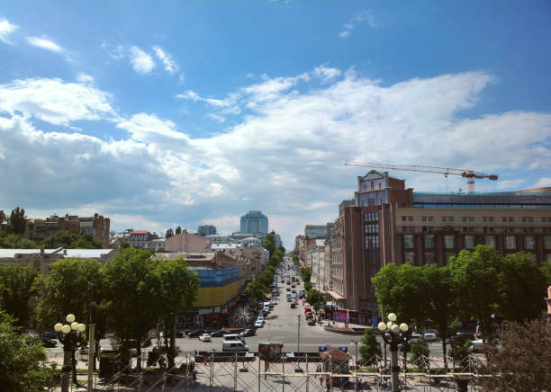 Kyiv, Ukraine - May 23, 2016: Khreschatyk Street on a sunny day in summer. Cars drive along the road along the central street of Kiev.