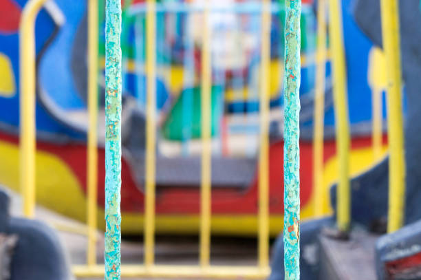 Old colorful iron bars with blury background