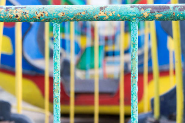 istock Old colorful iron bars with blury background 1142045891