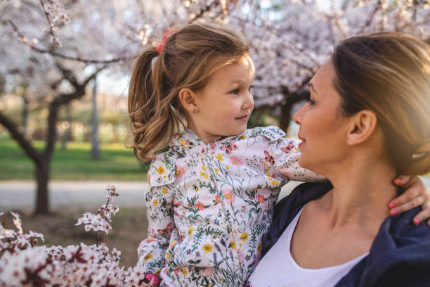 istock Gorgeous mother and a young daughter in Spring 1142046683