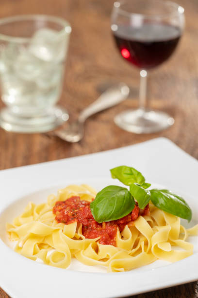 istock italian tagliatella pasta with tomato sauce 1142051551