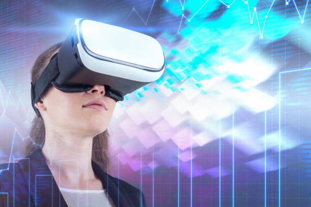 istock Woman in vr glasses looking at graphs 1142053631