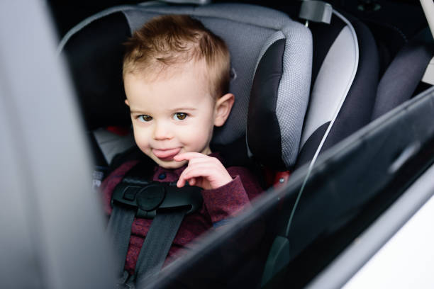 istock Silly Toddler in Carseat 1142061444