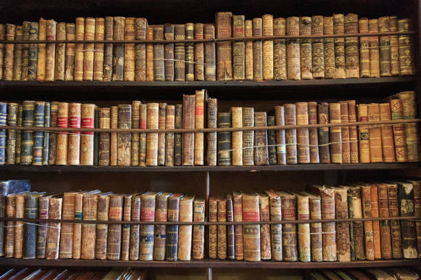istock Shelves full of old books. 1142073339