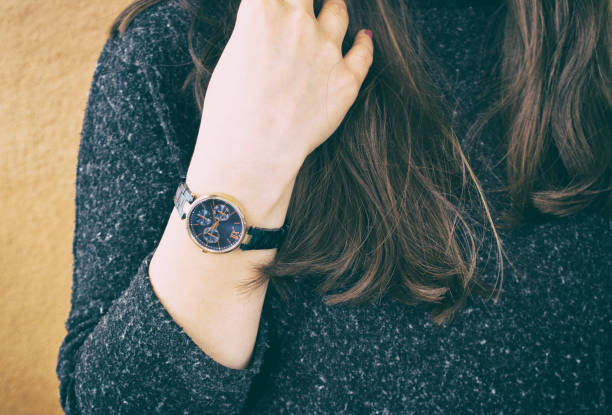 istock Stylish watch on woman hand 1142092572