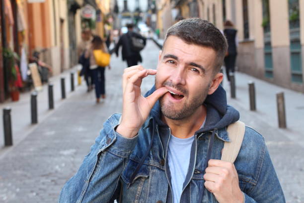 istock Man experimenting discomfort in his mouth 1142094042