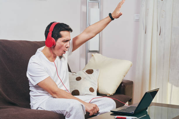 istock young boy enjoys listening to music 1142095833