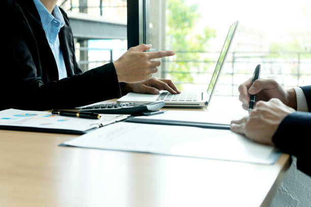 istock young business team in a small meeting 1142103616