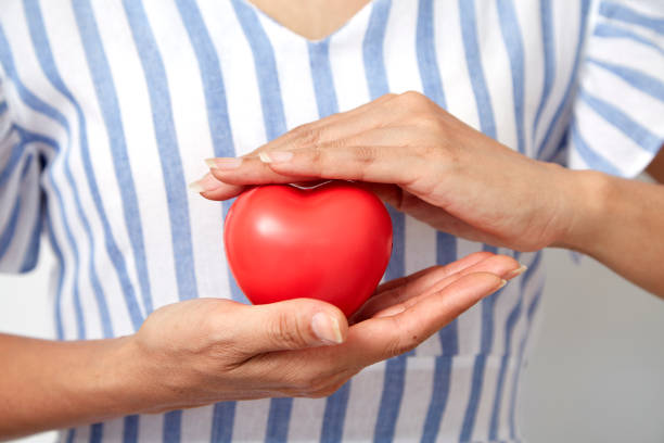 istock hand holding red heart shaped 1142114527