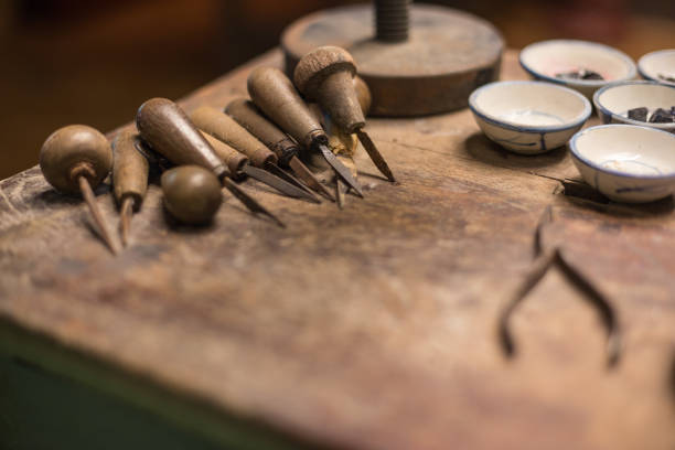 istock Ancient Carving tools on the old wood table 1142116362