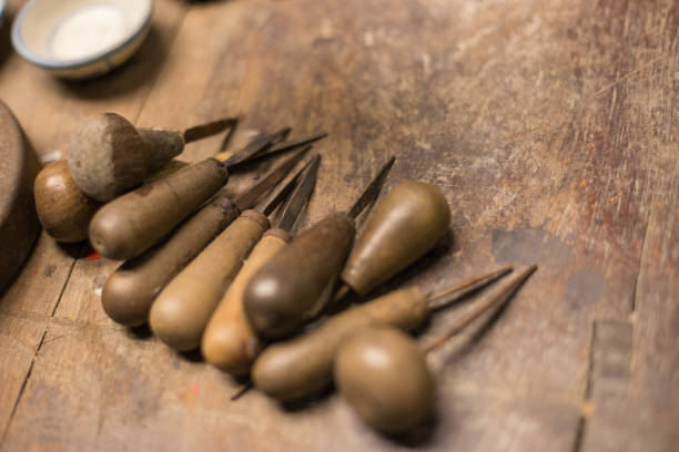 istock Ancient Carving tools on the old wood table 1142117807