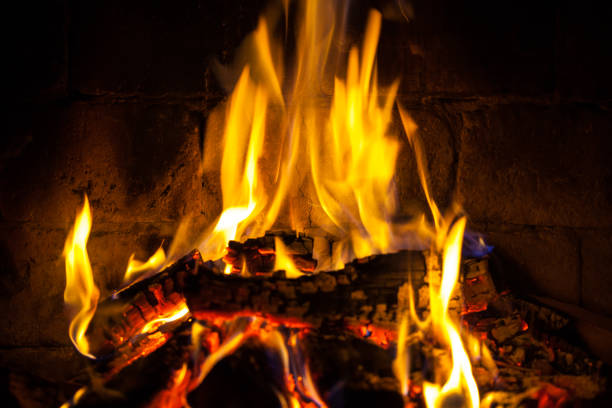 istock Wood burning in a cozy fireplace at home, keep warm 1142129797
