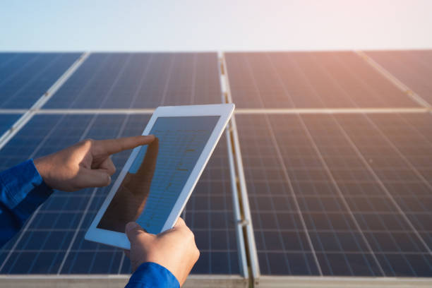 istock operation and maintenance in solar power plant ; engineering team working on checking and maintenance in solar power plant ,solar power plant to innovation of green energy for life 1142138747