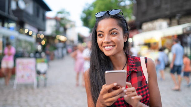 istock Asian tourist walking on street 1142139040