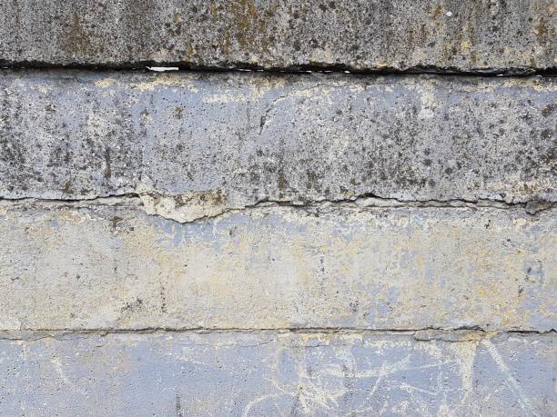 istock old cement concrete fence construction texture vintage weathered structure background 1142140729