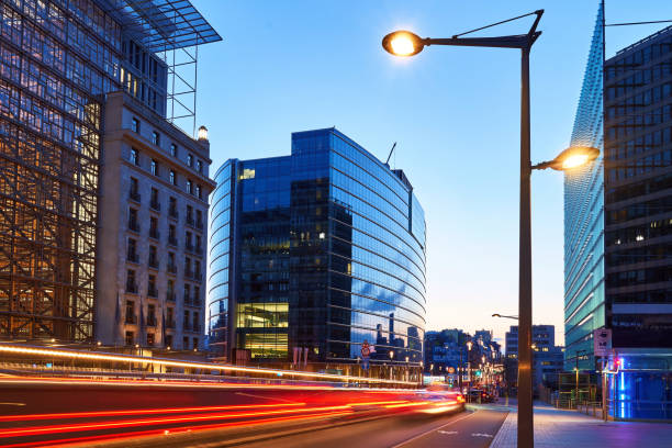 Free Stock Photo of Modern urban street at dusk with traffic light ...