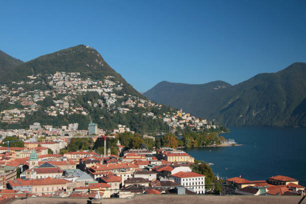 city and lake in mountains. lugano, switzerland - ticino canton mountain lake lugano lake imagens e fotografias de stock