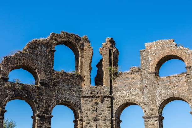 istock Ruins of ancient roman aqueduct 1142143267