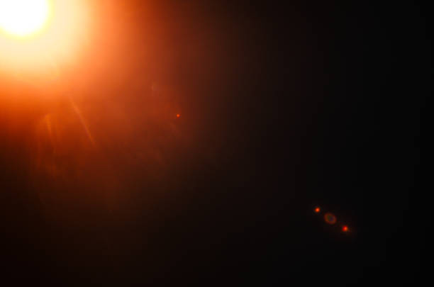 istock Abstract Natural Sun flare or Far star on the black background 1142147793