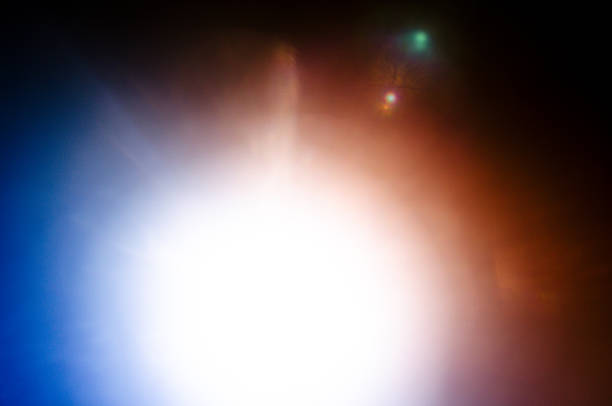 istock Abstract Natural Sun flare or Far star on the black background 1142147864