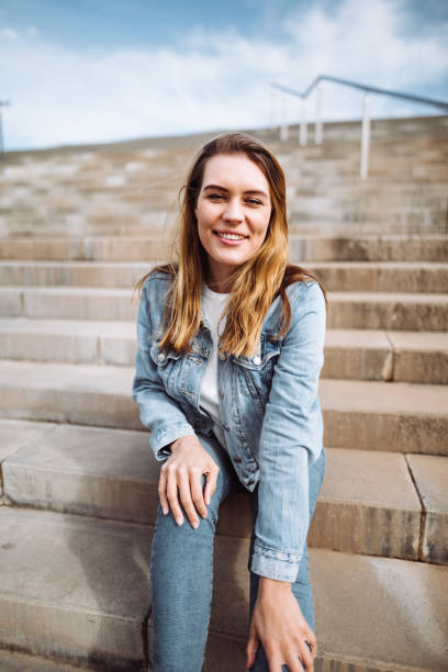 istock happiness woman smiling portrait 1142149835