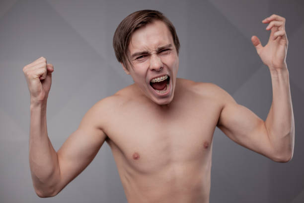 istock Nude white young man. Emotion. 1142150453