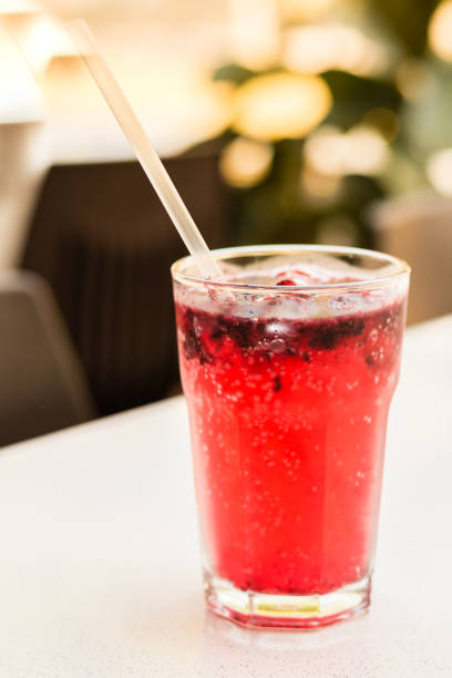 istock raspberry and Sprite lemonade with ice cubes in a glass 1142155517