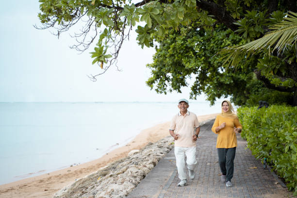 istock muslim mature couple doing jogging together 1142155597