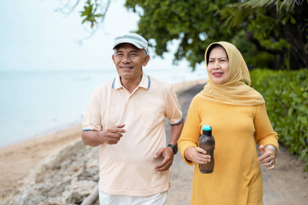 istock muslim mature couple doing jogging together 1142155646