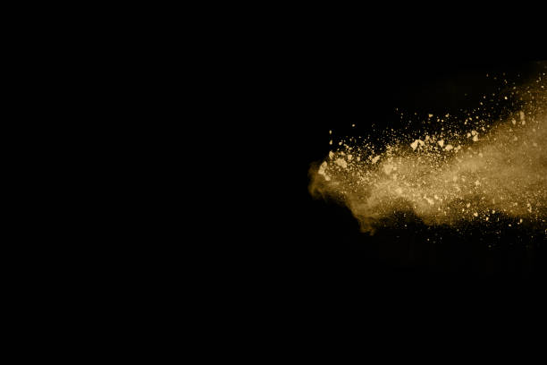 istock Golden powder explosion on black background. 1142157112
