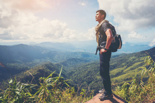 istock young people hiking in forest 1142159518