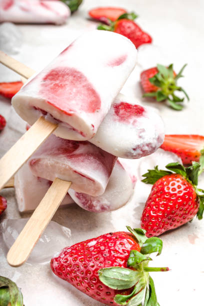 istock Homemade popsicles with yogurt or ice cream with strawberries 1142160006